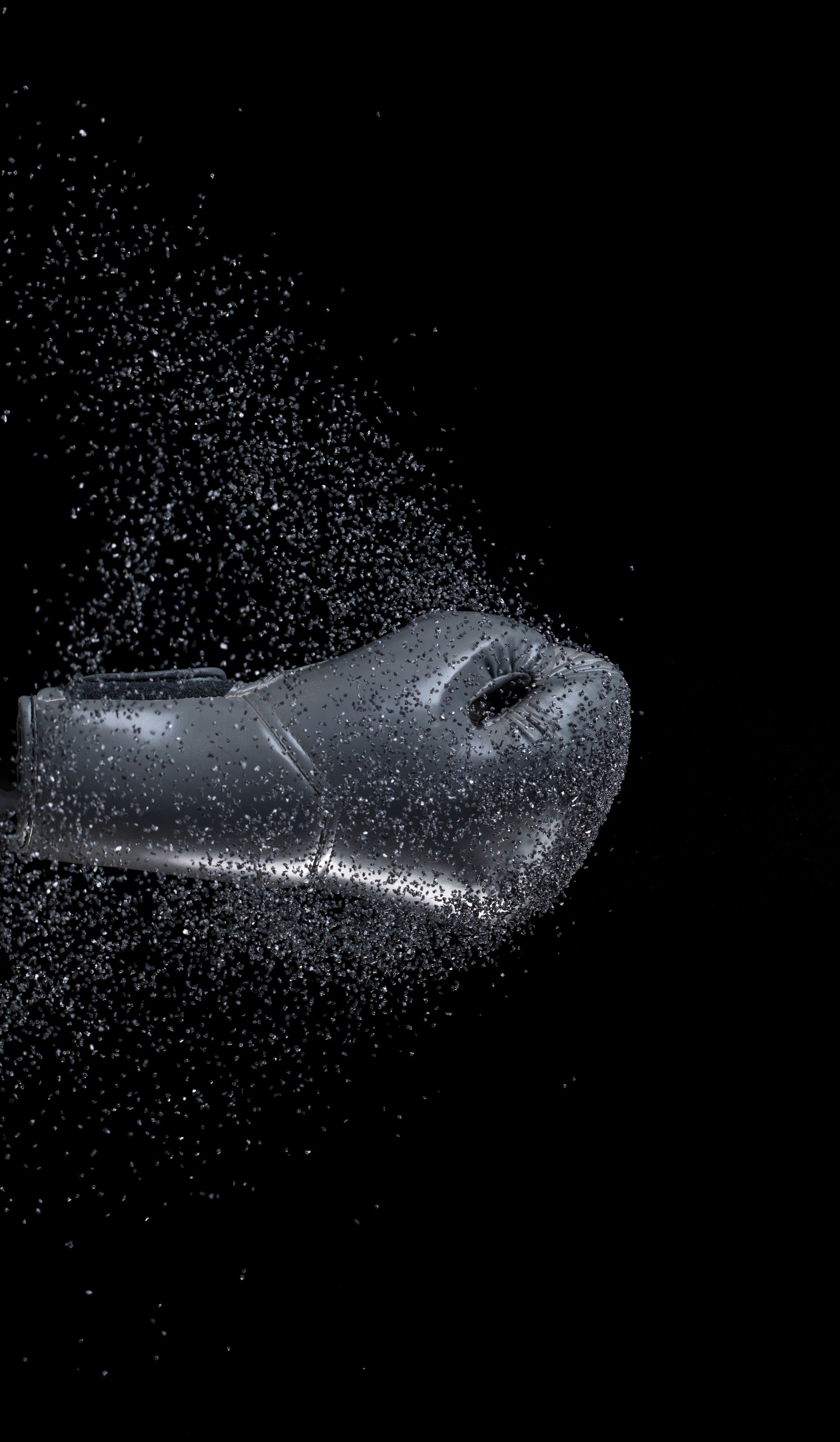 Boxing punch through Sand, concept of competition challenge of leader business man or teamwork, winning leadership strategic plan and risk management team player